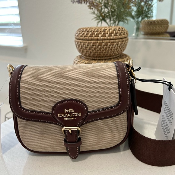 Coach Handbags - Coach Canvas Leather Small Saddle Crossbody Bag NWT